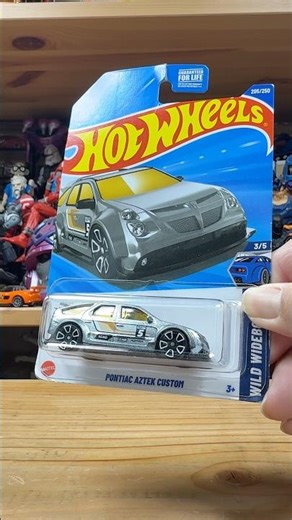 Pontiac Aztek a quirky, versatile crossover SUV known for its unique styling & functional interior