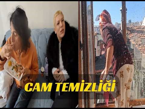 ONE PERSON CLEANED THE WINDOWS, TWO PERSONS ATE LAHMACUN (Turkish pizza).