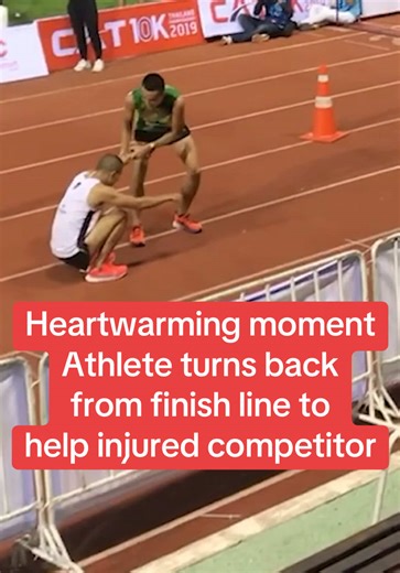 Athlete Helps Injured Competitor at Finish Line