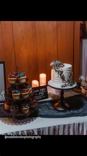 18 reactions | This intimate cutting cake with dark navy and burgundy...