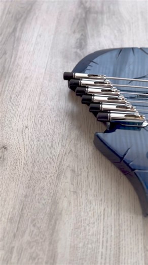GNG Fëanor Bass 6 string multiscale, massive 38/34” multilayered neck (ovangkol/purpleheart/wenge)with Birdseye maple fretboard and partially raised fretless area in ebony, with red-stained maple strips. Lightweight swamp ash body and flamed maple top, GNG cursing/3d scarring, Nordstrand pickups, and preamp. T4M Italian-made bridges. Thanks to Monsieur GB for ordering this one 🇫🇷 #multiscalebass #6stringbass | Giulio Negrini Guitars - GNG