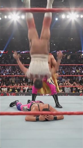 Epic WWE ring moment! One wrestler is down while two stand face to face 😭