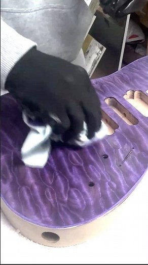 Staining this beautiful quilted maple top purple. #guitar #customguitars #handmade #handmadecraft