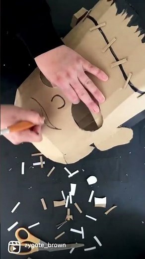An easy to make cardboard Frankenstein costume.