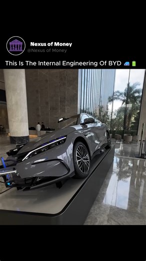 nexus of money on Instagram: "Most car companies hide their secrets. BYD sliced their flagship in half to show them off. 🚗🔋 You are looking at a dissected BYD Han, a visual autopsy of the company's vertically integrated engineering. The centerpiece here is the "Blade Battery," a structural component that doubles as the floor of the chassis. Unlike traditional cylindrical cells that waste space, these long, thin cells are packed tightly to maximize energy density and safety. Notic