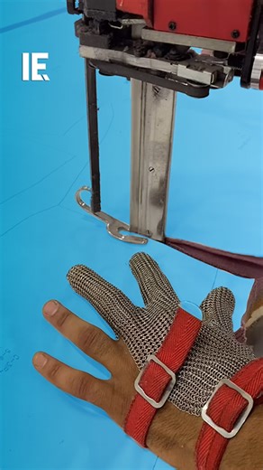 Interesting Engineering on Instagram: "A band saw machine effortlessly cuts through thick piles of material, with safety measures like a chainmail glove in place. What do you think of this industrial tool? 📹: @aziz_bey__"