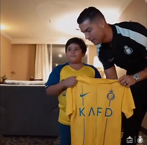 Cristiano Ronaldo has a young fan from Iran who was lucky to meet his football hero in Tehran. The young boy had his photo taken with Ronaldo and his shirt signed. What a memorable moment Hopefully he will grow up to become a football player for our national team. Who knows. | Iran Focused Forum