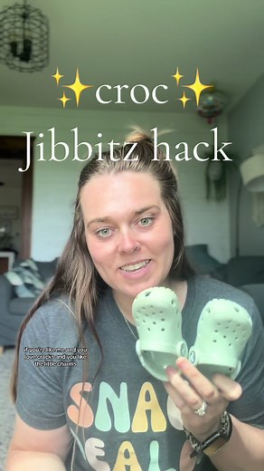 Lets out some charms on my toddler crocs. These things are a pain but with the pen hack they go on so much easier. Why cant cocs just make different sized ones. #jibbitz #crocs #hack #howto #toddlercrocs #sahm #momtok #girlmom #CapCut