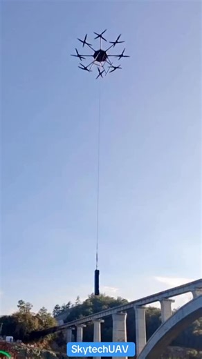 53 reactions |  Our heavy-lift drone is on duty at a remote mountain bridge construction site, transporting equipment and building materials where trucks can’t reach. ✨ The future of logistics is here!  Contact us on WhatsApp  www.Skytechuav.com #SkytechUAV #HeavyLiftDrone #FutureOfLogistics #DroneTechnology #NextLevelAviation | Skytech UAV | Facebook