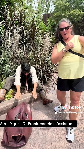 One way Epic Universe takes theme parks to a whole new level is through character interaction. Not just meet and greets but more natural encounters as you make your way through the portals. Ygor, a character from Universal’s Dark Universe at Epic Universe, is portrayed as Dr. Frankenstein’s assistant, often seen roaming the Darkmoor village within the land. Ygor is known for his unique character interactions and@is creating quite the following! #itravelwithjennie #ppvwithjennie #teamppv🌂 #unive