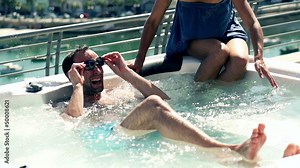 Rich people having fun in hot tub, slow motion shot at 240fps Stock Video