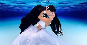 This Photographer Takes The Most Romantic Underwater Wedding Photos