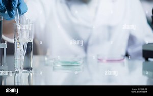 Laboratory worker checking viscosity and kinetic abilities of substance, science, stock video Stock Photo - Alamy