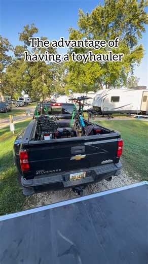 Kelley & Renee | RV Life | Travel | RV Tips on Instagram: "How do you load & unload your bikes? 🚲 The advantage of having a toy hauler is the ebikes are kept secure in the RV at all times. Also, it’s easy to load & unload the @lectricebikes using the ramp. If we are driving to a trail to ride we pull the truck right up to the ramp to load & unload. If we are biking locally we use the ramp to roll the bikes in & out of the camper. Follow along with us @fiftyandfifthwheeling for RV Tips & Travel