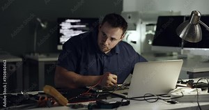 Happy, celebration and man repair computer hardware, electronics or test circuit board of semiconductor. Achievement, IC multimeter and person celebrate fixing CPU, PC or maintenance success at night