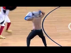 NBA - Hawk mascot vs Referee