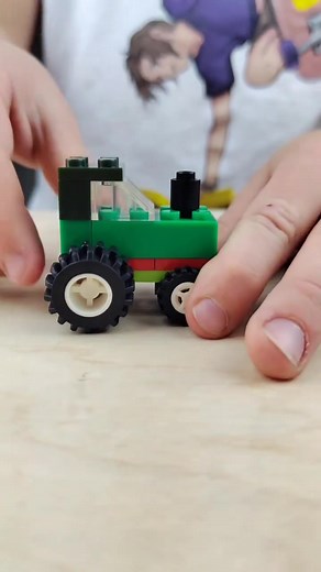 Assembling a Colorful Lego Tractor Toy