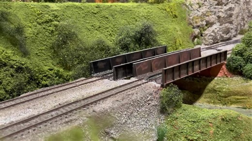 With Halloween night going into full swing the many towns along the railroad find themselves needing more candy for all the events and all those that are trick or treating. Even the local candy factory is having difficulty keeping up with demand so a special train was brought in all the way from the Big Rock Candy Mountain. Leading the train were two appropriately Halloween themed units from the Southern Pacific, engine #5665 in the Pumpkin/Halloween scheme and engine #5678 in SP’s Black Widow s