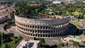 Roman Colosseum aerial view. Flavius Amphitheater is an architectural monument of Ancient Rome, an aerial view. Rome, Italy