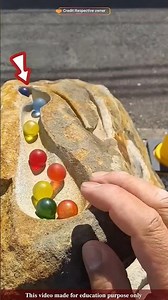 The glass balls bounce up and down between the rocks |#shortsvideo