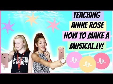 Teaching Annie Rose how to make a Musical.ly!