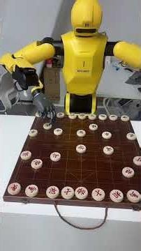 Playing chess against a robot—and losing. #HumanoidRobot