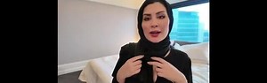 Mira Al-Nouri caresses her