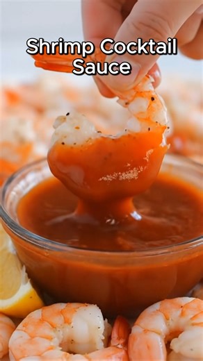 Shrimp Cocktail Sauce A classic crowd-pleaser featuring tender baked shrimp dipped in a zesty, spicy homemade cocktail sauce. This appetizer is perfect for parties and tastes best when chilled before serving. 📝 Ingredients: Baked Shrimp: 2 lbs raw shrimp (16-20 ct), peeled and deveined with tail-on 1 1/2 Tbsp olive oil 1/2 tsp sea salt 1/2 tsp black pepper 1 lemon, cut into 4 wedges to serve (optional) Shrimp Cocktail Sauce: 1/2 cup ketchup 1/2 cup mild chili sauce (e.g., Heinz) 3-4 Tbsp prepar