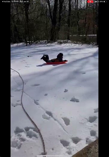 Sledding down a hill