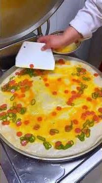 English translation of "#鸡蛋饼" is "Egg Pancake".