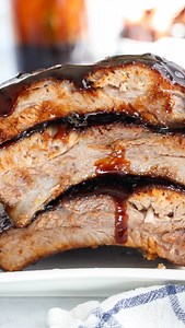 2.2K views · 35 reactions | Comment “RIBS” and I will send you the recipe! These Oven Baked Ribs are juicy, tender, and fall-off-the-bone good. Slathered in a homemade barbecue sauce, these ribs are full of sweet and smoky goodness. #ovenbakedribs #ovenbakedribsrecipe #ribs #ribsrecipe | Simply Home Cooked | Facebook