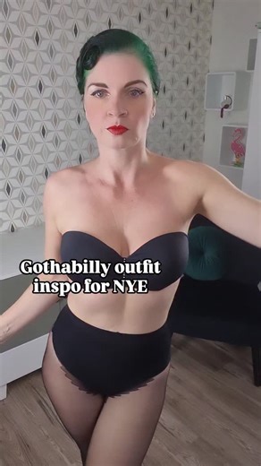 Jes | Gothabilly styles & vintage fashion inspo on Instagram: "🖤🥀 It's ok to sparkle on NYE, even for ghouls, right? So this is my idea for a gothabilly outfit for New Years Eve: I paired a glittery swing skirt with a dark red blouse, added a harness and a lace fascinator to my hair plus some goth inspired earrings and favorite boots. What do you think? Skirt @topvintage_boutique Blouse @bannedapparel Harness is an Amazon find Earrings @farawayberlin Fascinator @mirandas.choice Boots @chelseac