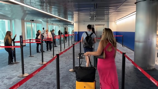 What smart travelers pack to survive a long flight in economy