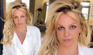 Britney Spears flaunts early baby bump as she models outfits