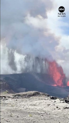 Funnel cloud of ash forms next to spewing lava in Hawaii