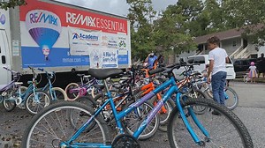 100 kids surprised with free bikes