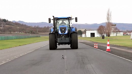 Blue Tractor Performance on Paved Road