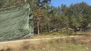 A military Humvee falling from sky in NC