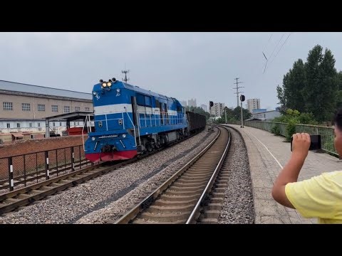 Watch This Stunning Blue Locomotive Speed Around the Curve!