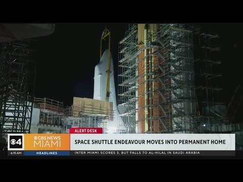 Space shuttle Endeavour lifted into vertical position for ultimate museum display in California