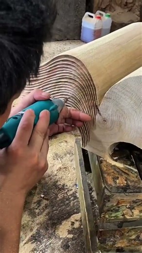 carving wood into book shapes that are used as decoration in home architecture