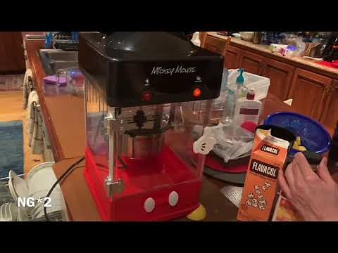 Homemade popcorn via cute mickey mouse popcorn machine