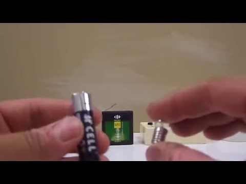 012 cinquième electricité - Allumer une lampe avec une pile ronde