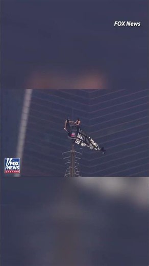 Climbers Scale Empire State Building, Plant Flag With Message