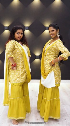 Team Naach on Instagram: "Here is the PART 2 of the routine. Bringing back the classic throwback. It is a sangeet mashup of Gud Naal Ishq x Nachdene Saare. Check our previous reel for PART 1. @quadros_andrea @yoshetaa Outfits @labelishnya #yoshrea #teamnaachchoreography #sangeet #sangeetvibes"