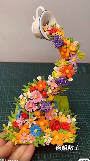 Craft and DIY | Spilling a little magic onto your feed! ✨ This floating teacup pouring a river of handcrafted flowers is pure enchantment. Every single... | Instagram