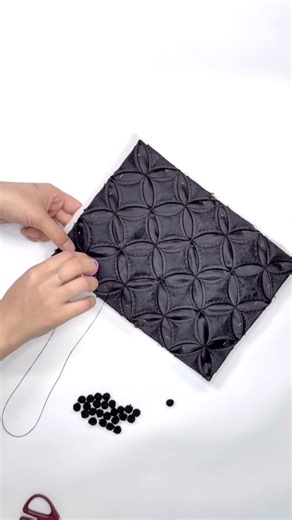 PYOGO STUDIO on Instagram: "Part of the making process of the Yeoui Tote Bag. Adding hand-knotted balls and padding to the back to create depth and volume. Yeouijumunbo — Korean textile craft, hand-stitched by Korean artisans. Once the Yeouijumunbo is completed, this step adds structure, depth, and volume before it is incorporated into the bag."