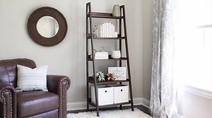 Looking to add some style to an empty corner or wall? Watch as #DIY expert and House One editor Jenn Largesse shows you how to build an easy leaning ladder bookcase. Total price – about one-third the cost of buying one pre-made! | This Old House