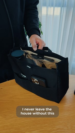 Hey, it's Rex, founder at Orbitkey, and I wanted to share how this bag insert saves me so much time. When I get to work in the morning, I take the insert out of the bag and I plonk it on the table. What I love about it, it's a bird's eye view of everything, all my accessories, so anything I need, I can see it straight away. I've got my mouse to start my work, and I've got my AirPods as well, and I've got my coffee as well. At lunchtime, I might want to grab my book, and during meetings, I've got