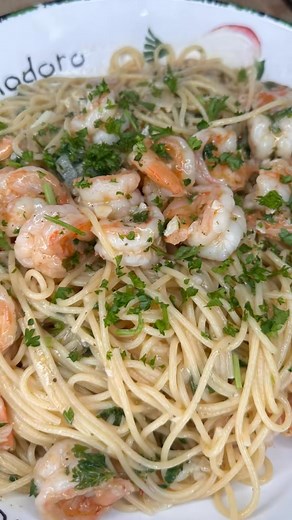 Ingredients: 1 lb shell on, deveined frozen shrimp 1 & 1/2 cups of white wine 3 tbsp worsterchire, divided 8 garlic cloves chopped 5 cloves whole 1 bunch of parsley, divided 1 lemon salt & pepper to taste 1 tsp Old Bay seasoning 1 shallot, chopped 1 tsp crushed red pepper 1 tsp of calabrian chili oil 6-7 tbsp olive oil, divided 6-7 tbsp of butter cornstarch slurry: 1 tbsp cornstarch juice of 1/2 lemon 3/4 of a pound of thin spaghetti Directions: In a bowl separate the deveined shrimp from the sh